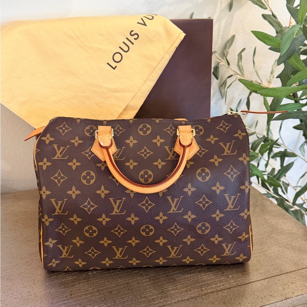 Louis Vuitton Monogram Canvas speedy 25 in Brown and Natural Vachetta